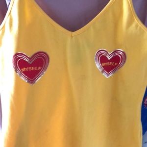 Yellow onesie with hearts